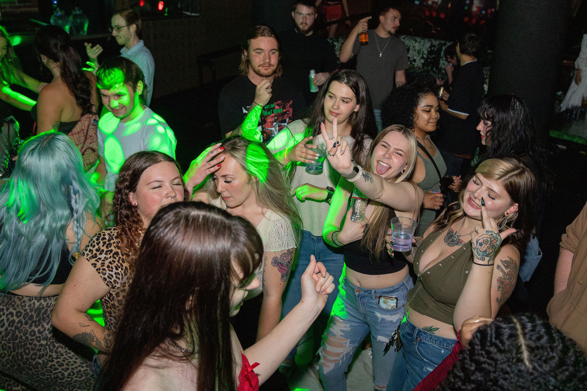 pictures of people at Amsterdam Lounge, Dirty Little Roddy's, StrangeLove, and Karma